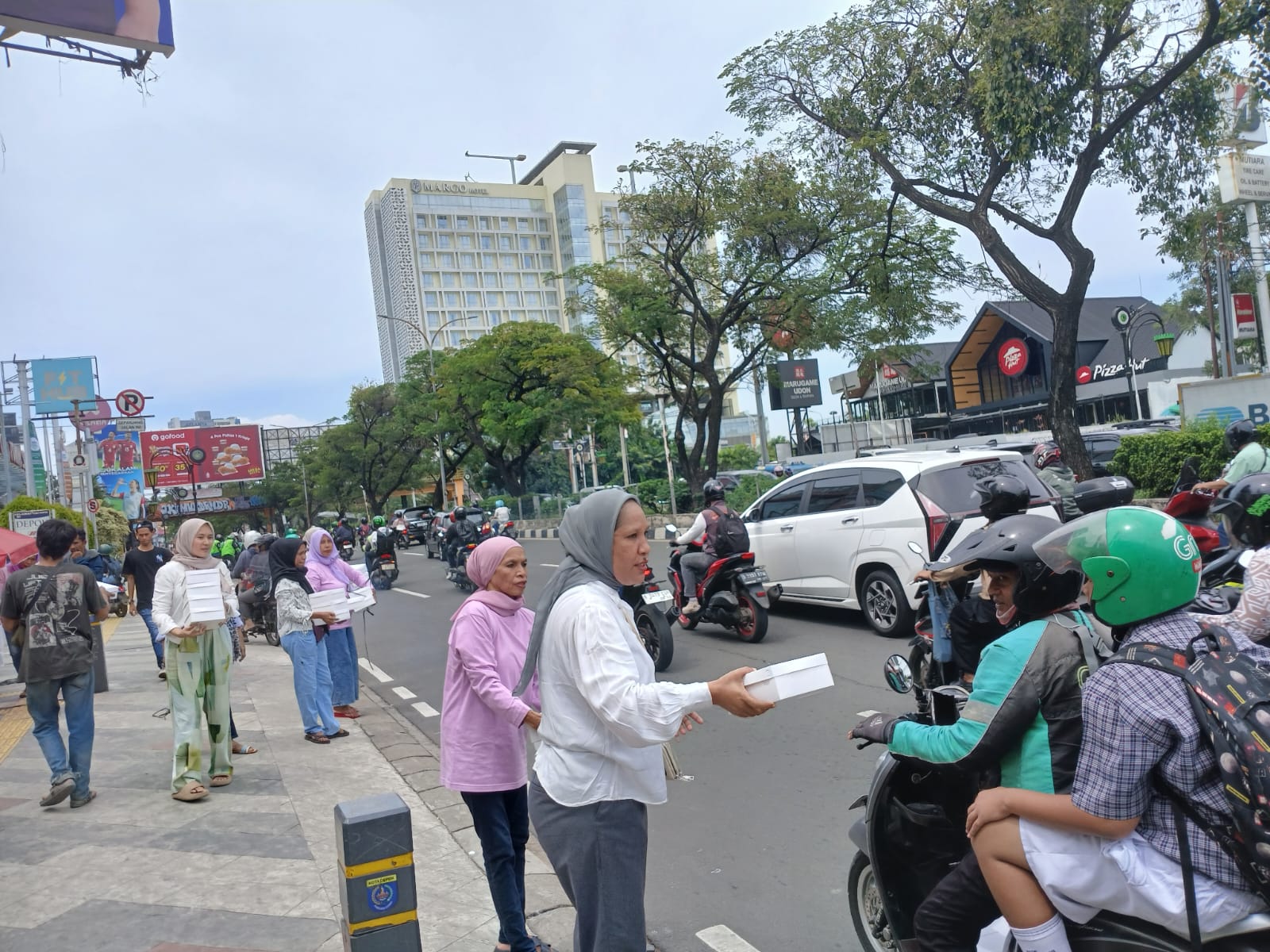 Ormas Garda Maningkamu Pelauw Kembali Berbagi Paket Sedekah, Jumat Berkah di Kota Depok
